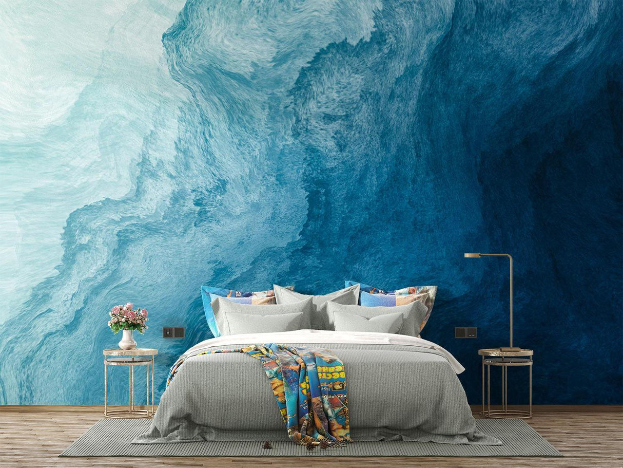 Blue wave wallpaper bringing movement to a minimal home office space
