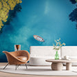 Turquoise ocean view wallpaper creating depth in a modern living room with natural light highlighting the aerial perspective