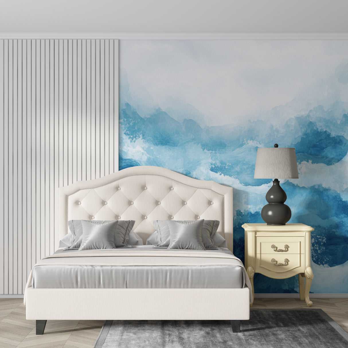 Ocean wave wallpaper creating a serene atmosphere in a modern living room with white furniture