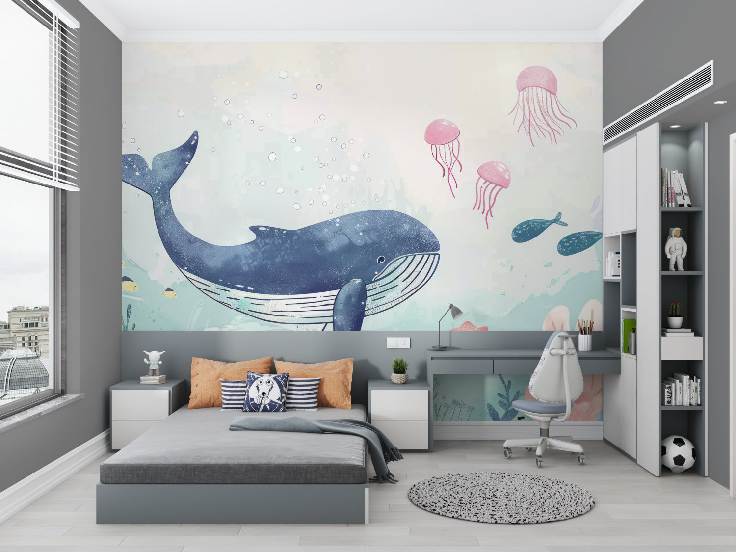 Ocean theme nursery wall with blue whale and pink jellyfish mural creating calm environment