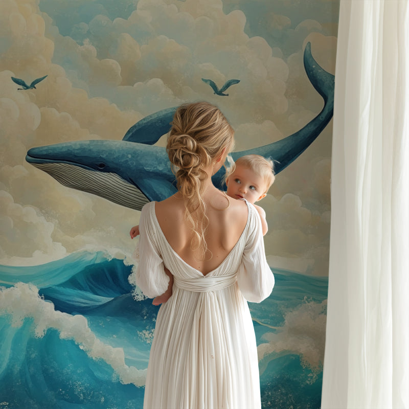 Whale wall mural creating depth in a cozy reading nook with natural light