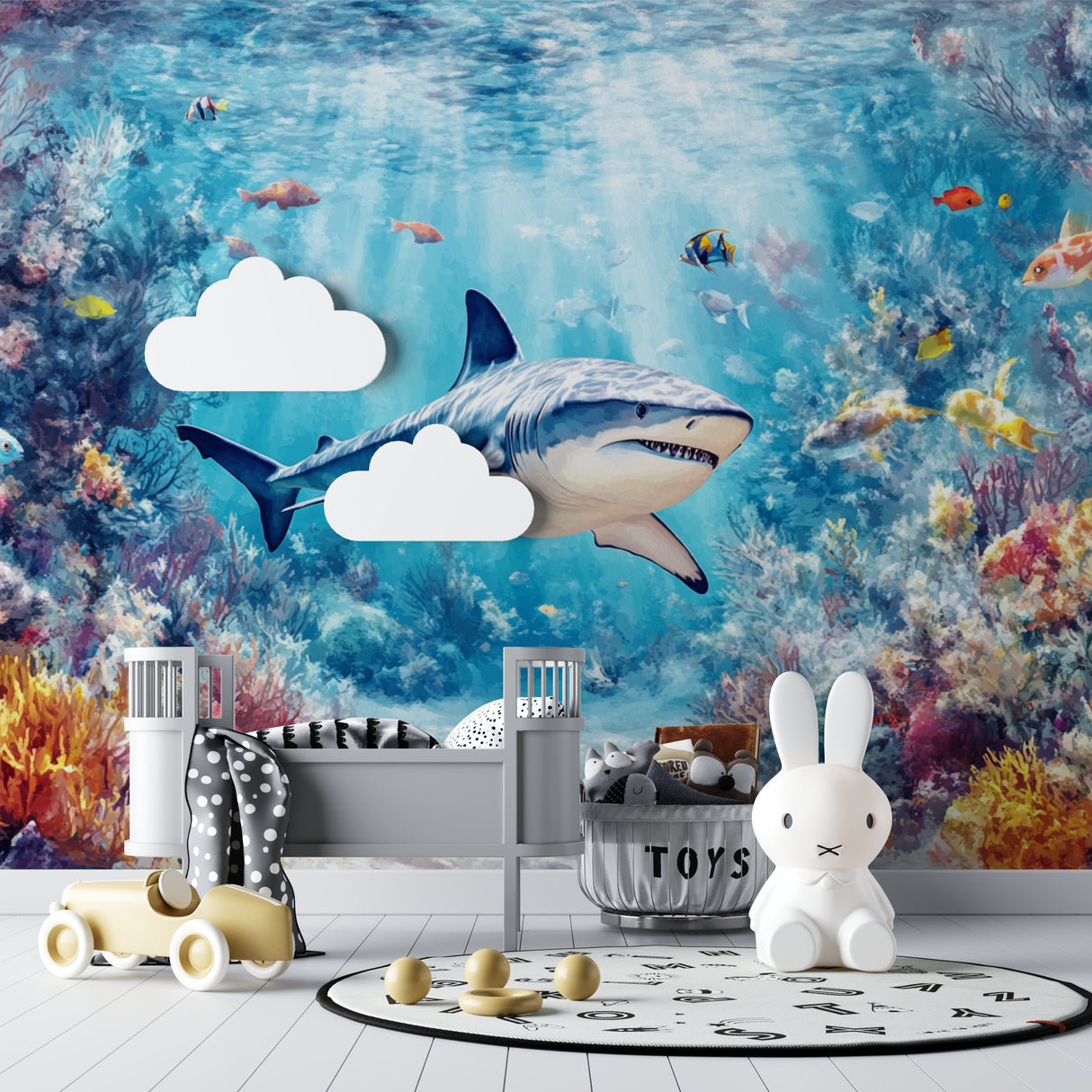 Marine life wallpaper installation in playroom with shark theme