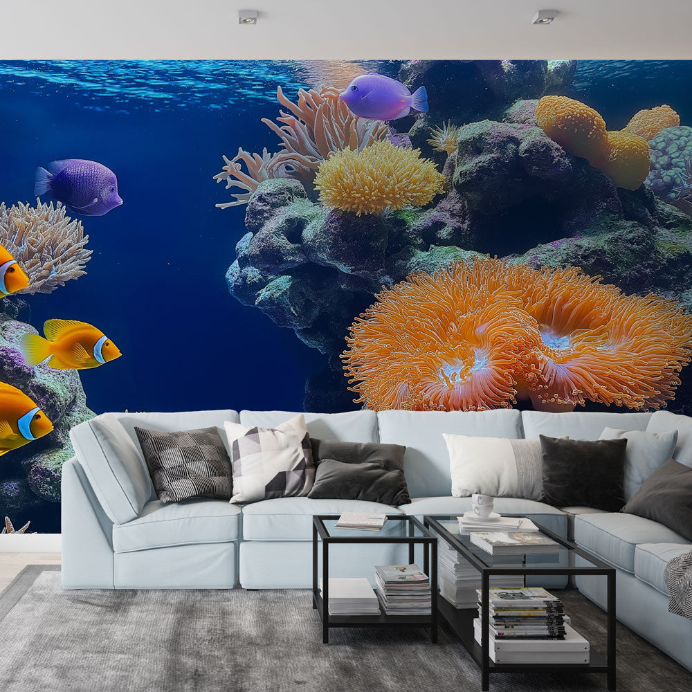 Ocean reef wallpaper mural showcasing vibrant tropical fish in a modern living room setting with natural light