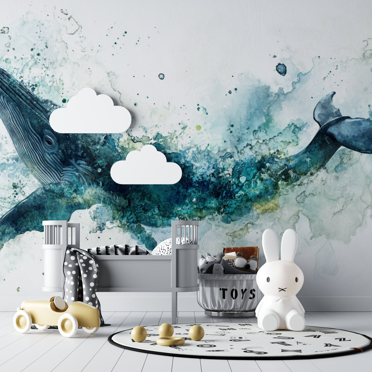 Whale wall mural displayed in cozy kids bedroom, showing scale and dreamy watercolor effect