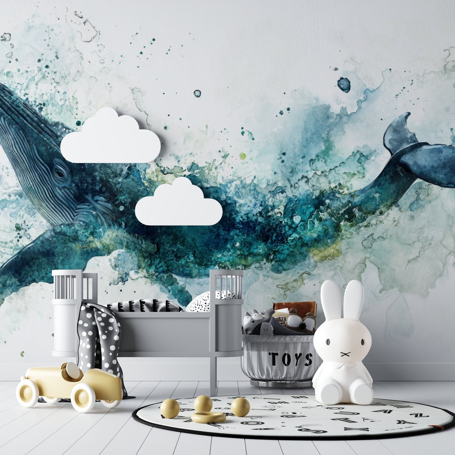 Whale wall mural displayed in cozy kids bedroom, showing scale and dreamy watercolor effect