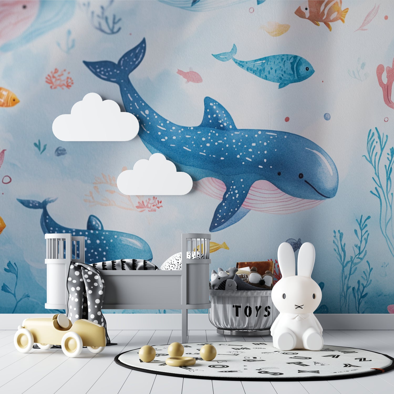 Watercolor whale wallpaper bringing calm to a coastal-style children's bedroom