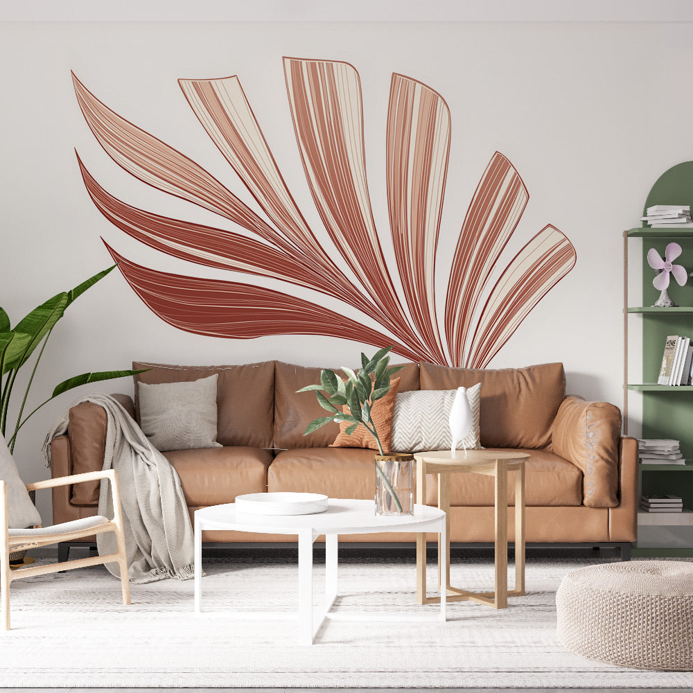 Terracotta palm leaf wallpaper in modern living room creates calm, natural atmosphere with soft lighting and minimal furniture