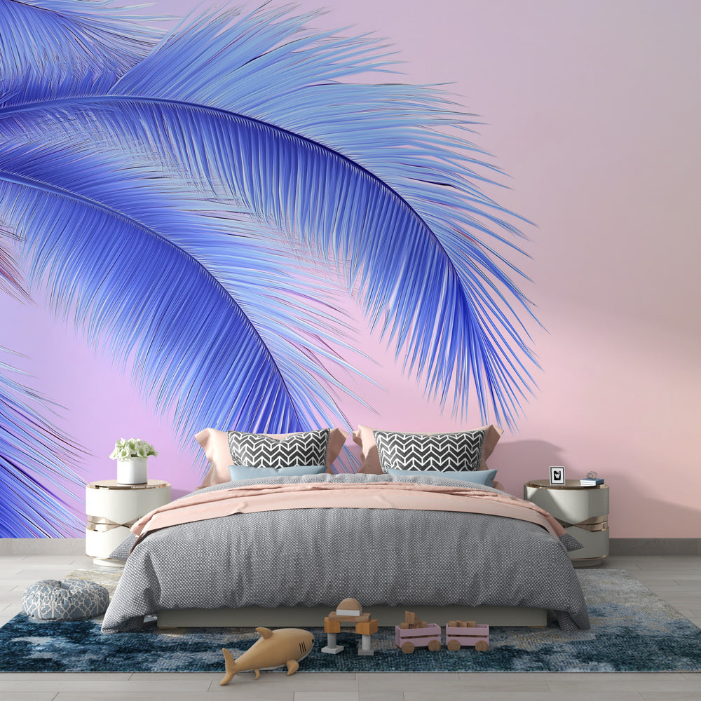 Modern living room with blue palm leaves wallpaper on pink background, showing natural light interaction with tropical wall mural