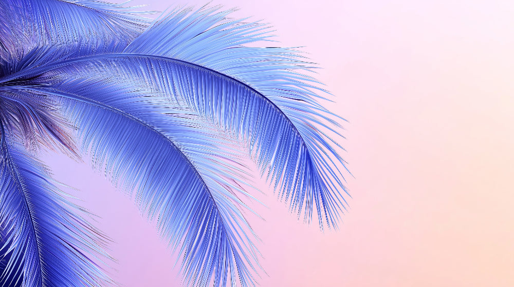 Blue tropical palm leaves design file on pink background, showing intricate leaf details and pattern