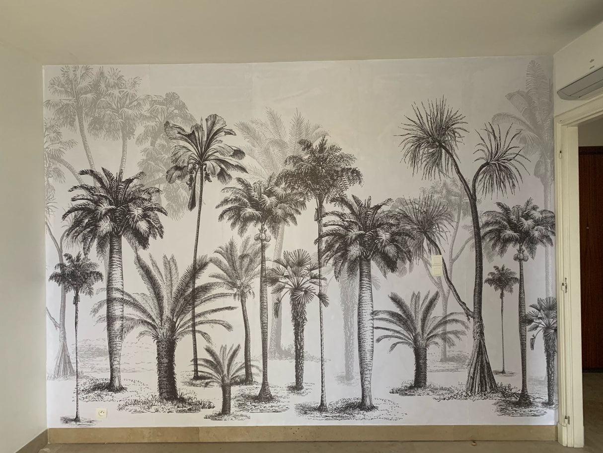Tropical palm tree mural creating a striking accent wall in a dining room with modern styling