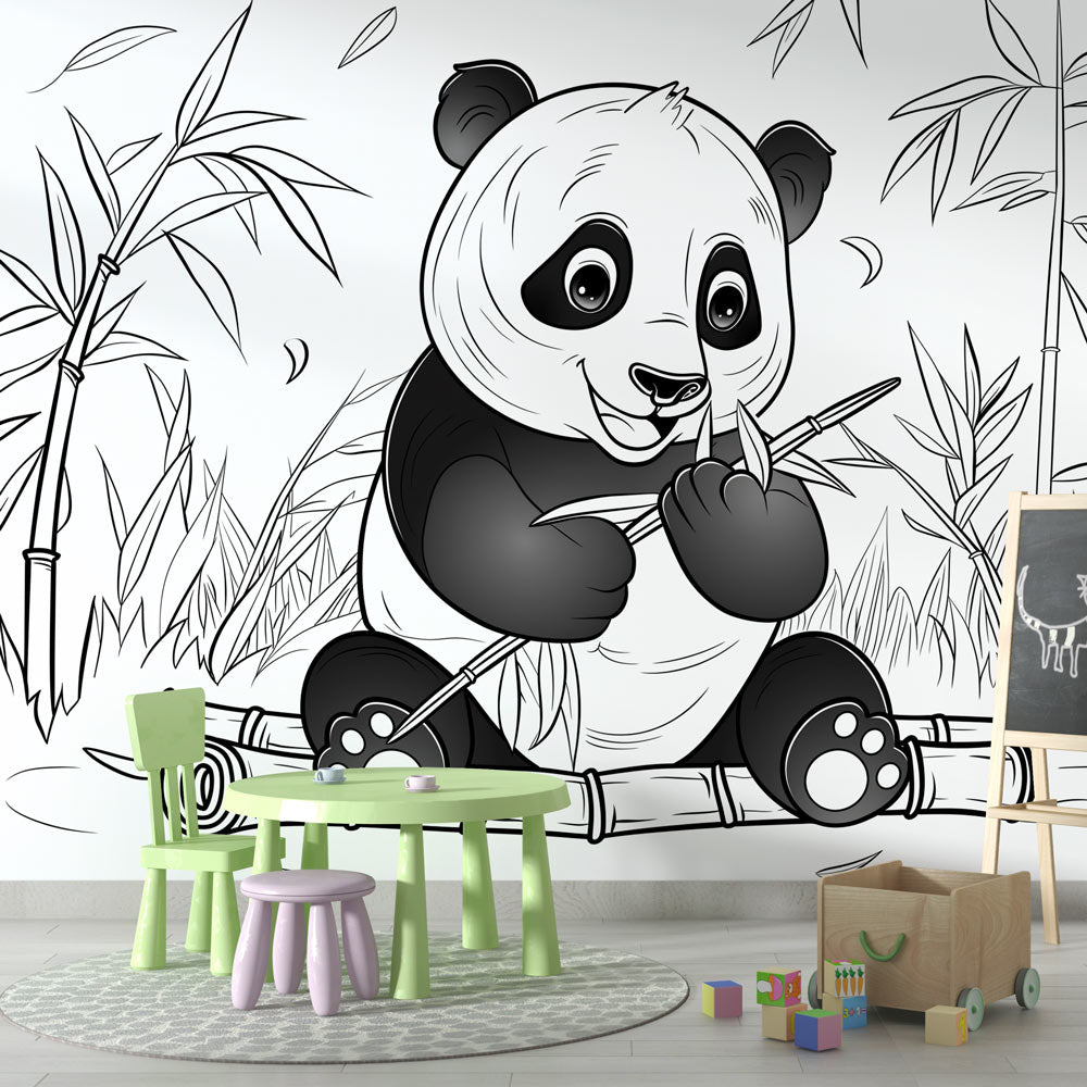 Panda wallpaper mural in a modern nursery with white furniture and natural light showing the peaceful black and white design