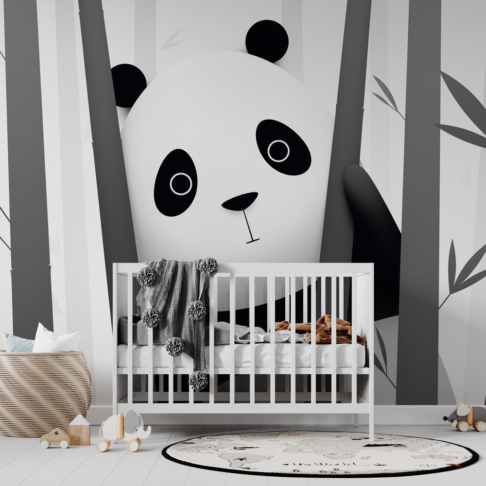 Black and white panda wallpaper creating a calm atmosphere in a modern nursery with minimalist furniture