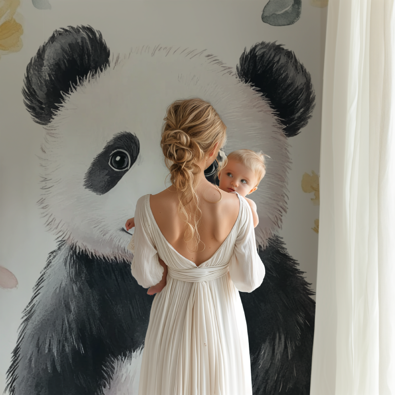 Watercolor panda wall mural in a playroom with natural wood elements