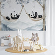Panda wallpaper mural styled in modern nursery with white furniture and natural light