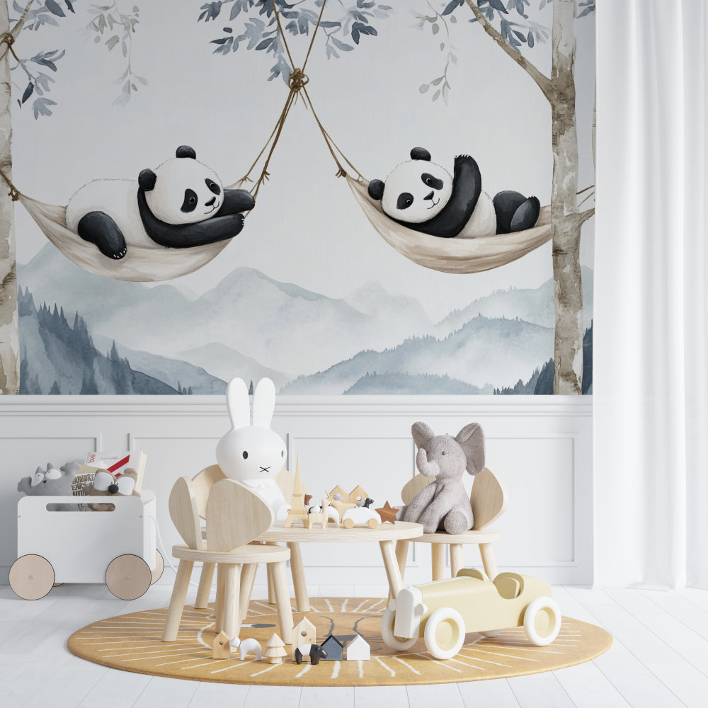 Panda wallpaper mural styled in modern nursery with white furniture and natural light