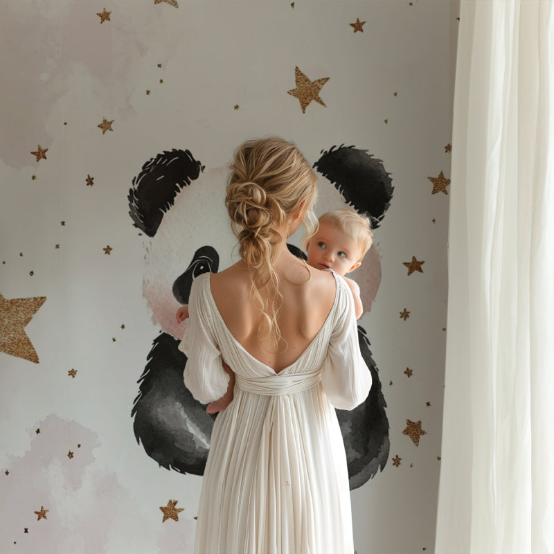Starry panda wallpaper adding warmth to a baby's nursery
