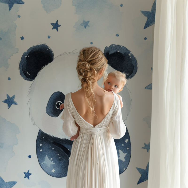 Panda wallpaper mural in a cozy nursery with soft lighting showing the starry night effect