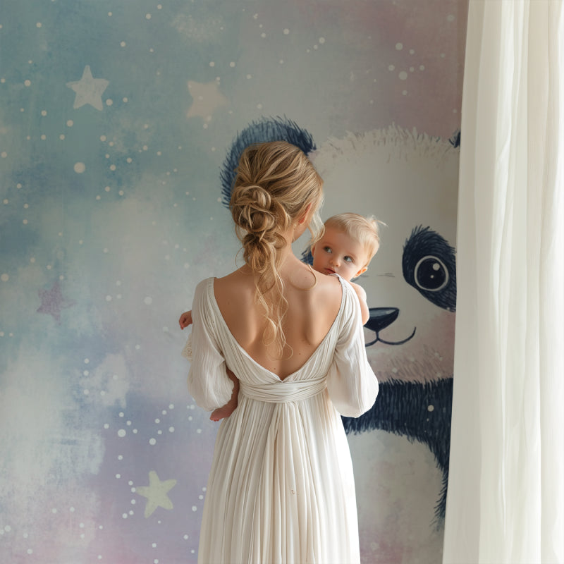 Nursery room with panda star wallpaper creating a peaceful sleeping environment