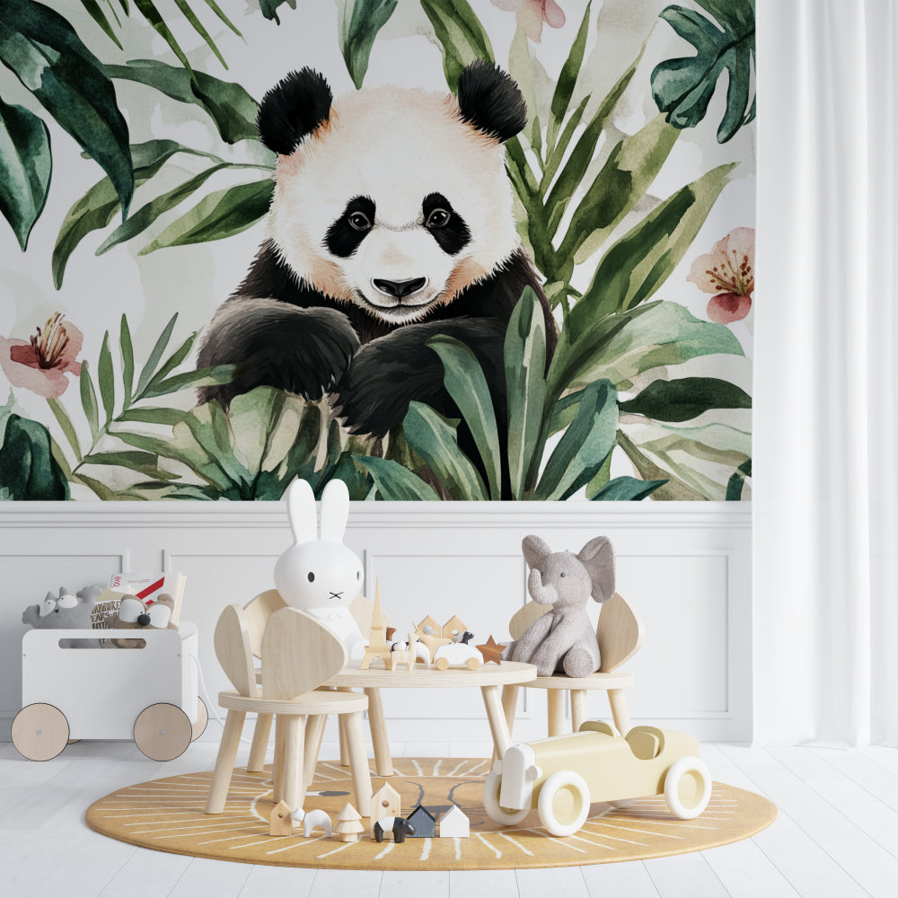 Panda wall mural in modern nursery showing gentle watercolor design with tropical leaves