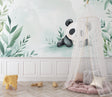 Panda wallpaper mural in a cozy nursery with rocking chair and soft lighting