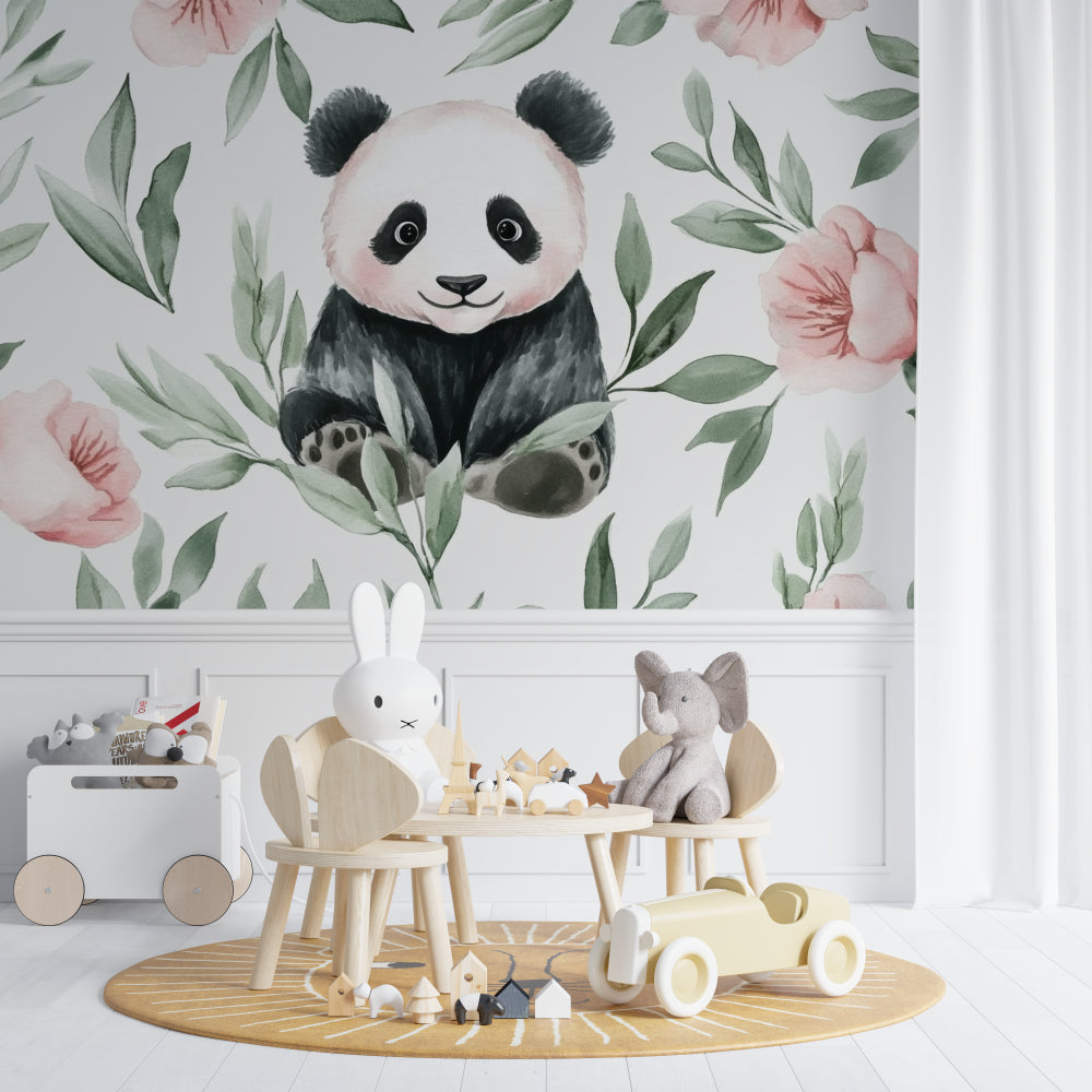Panda wallpaper mural in a bright nursery with white furniture, showing scale and soft pink tones