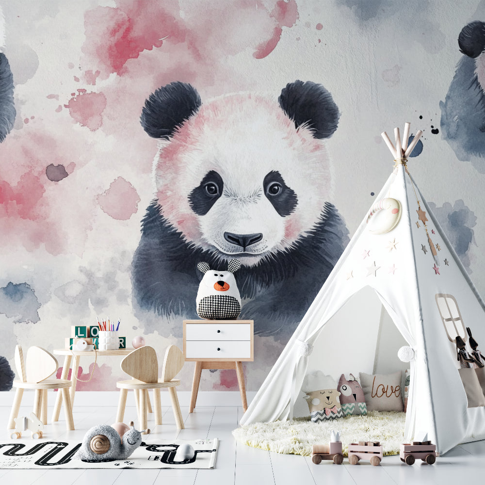 Pink watercolor panda wallpaper in a cozy nursery with white furniture and soft textiles