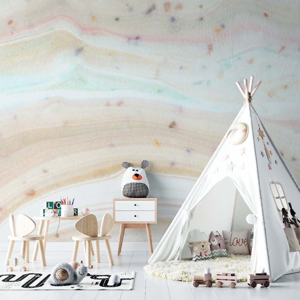 Soft wave nursery wallpaper complementing a reading nook with natural lighting