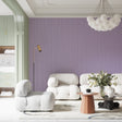 Lilac textured wallpaper creating a serene atmosphere in a modern living room with natural light