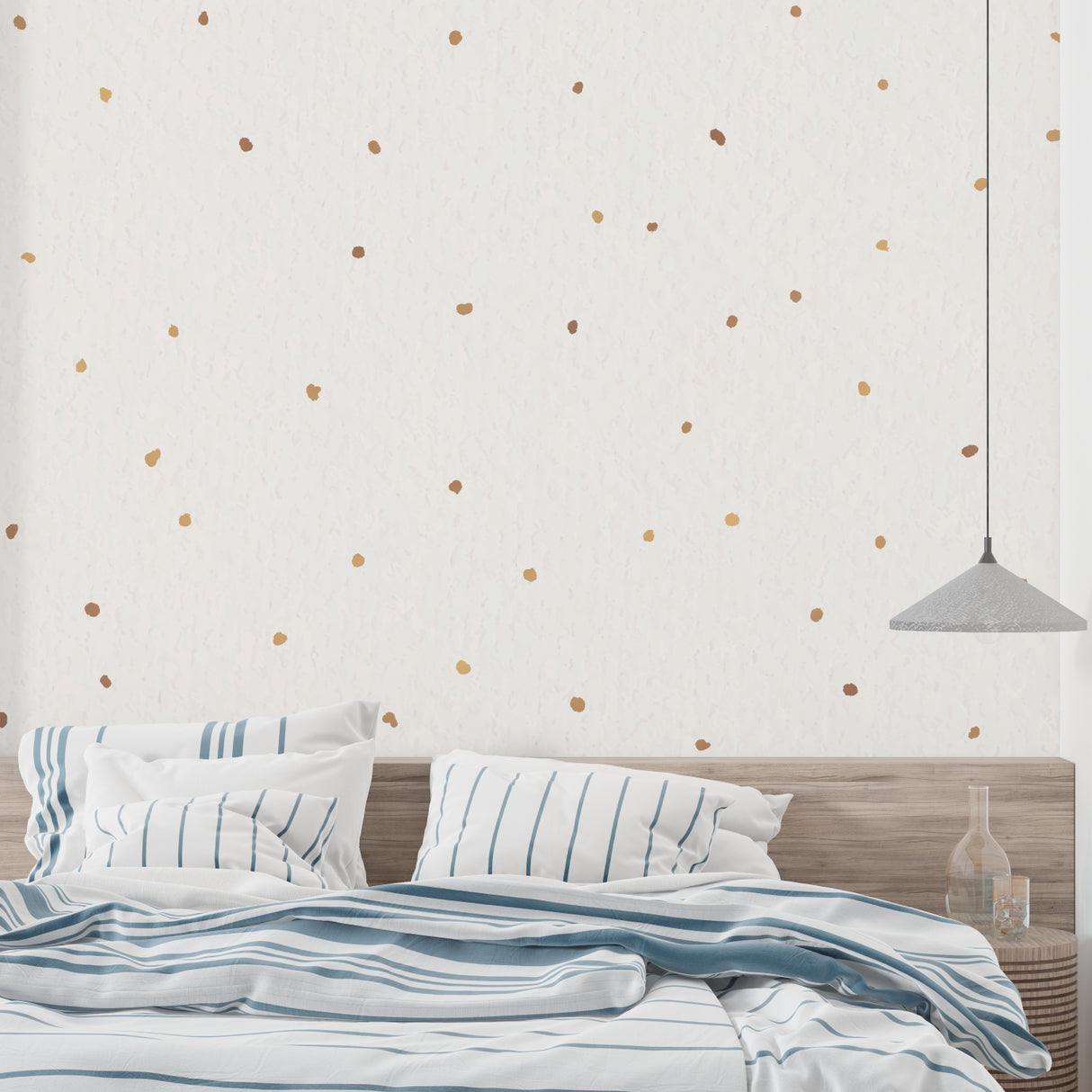 Golden polka dot wall mural in cozy bedroom setting with minimal furniture