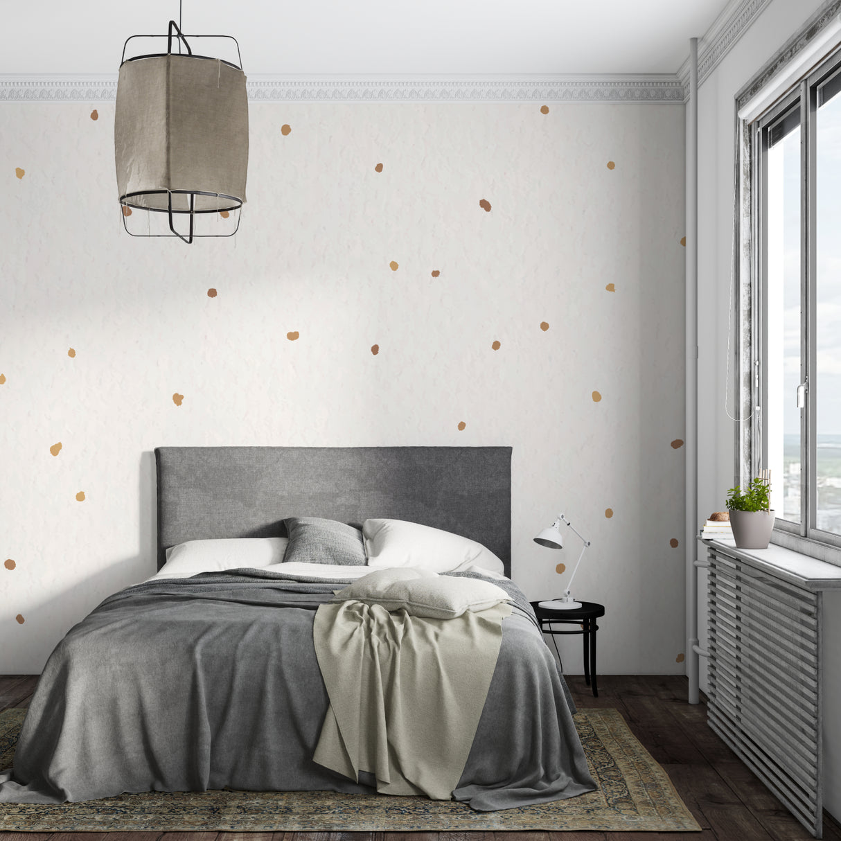 Gold and white dot wallpaper in dining room with evening lighting