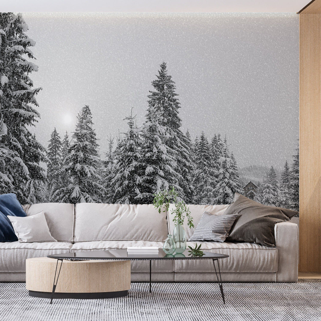 Snowy forest mural adding depth to a monochrome bedroom with soft lighting