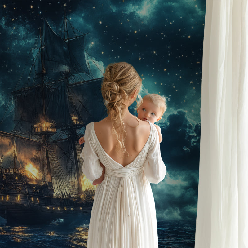 Nautical wall mural bringing adventure to a modern playroom with dramatic ship details