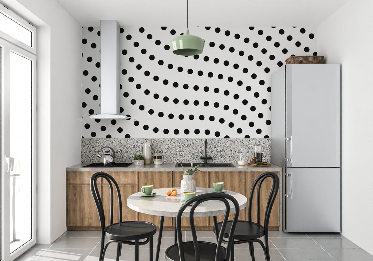 Black and white polka dot wallpaper in modern living room showing diagonal pattern and clean lines