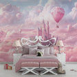 Princess castle wallpaper in a bright girl's bedroom, pink hot air balloons floating above bed