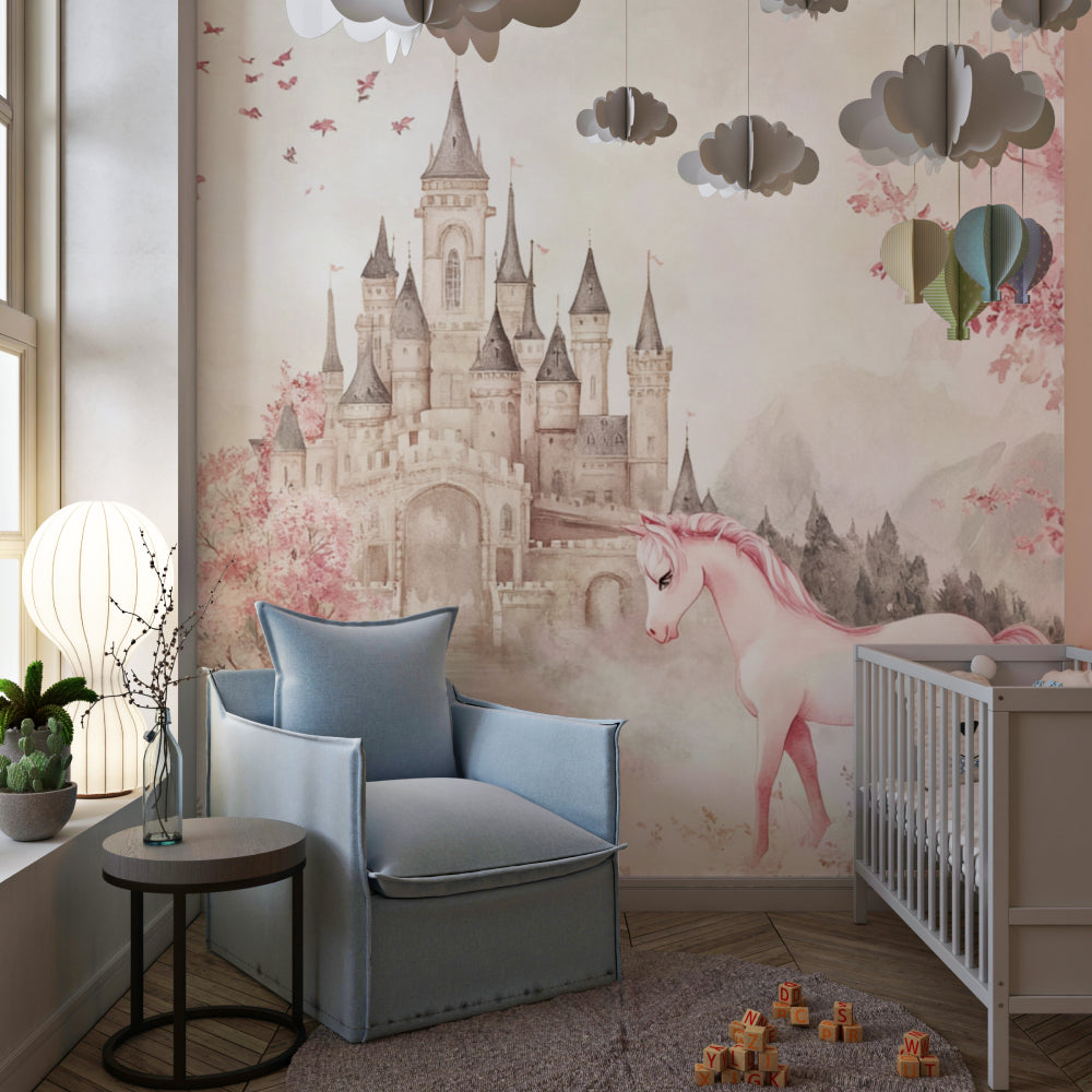 Enchanted castle mural with unicorn featured in a modern nursery setting with white furniture