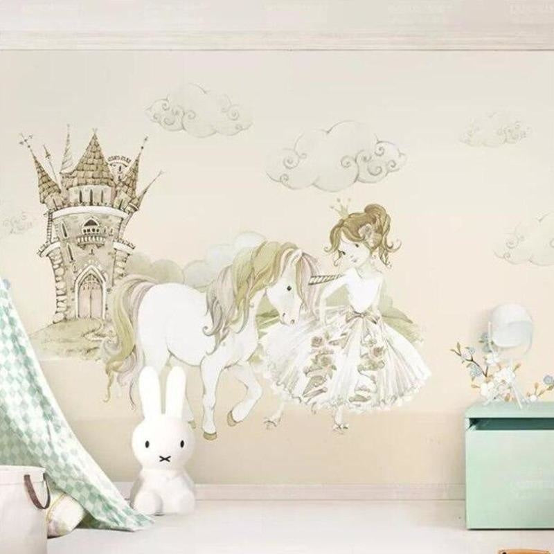 Princess wall mural featuring unicorn and castle in a girl's bedroom with pink accents and reading nook