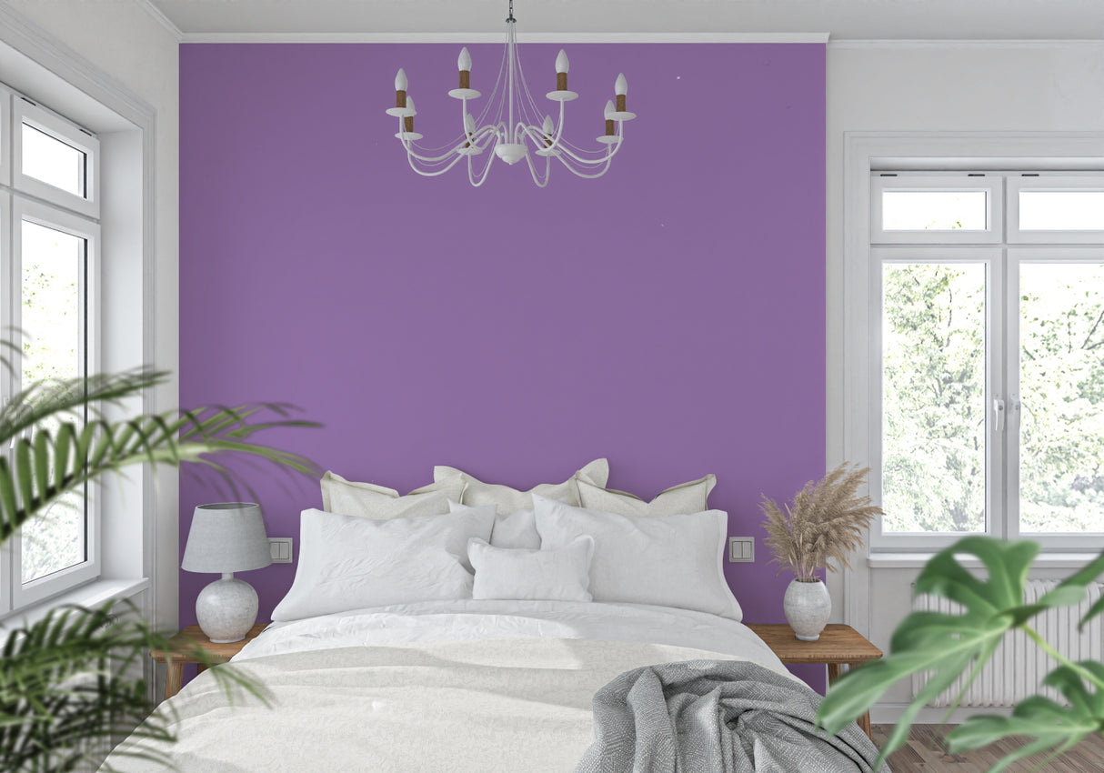 Pastel purple mural wallpaper featured in a stylish home office space