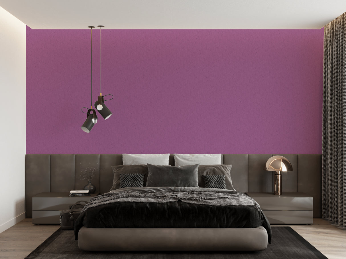 Purple solid color wallpaper in a cozy bedroom setting with natural light