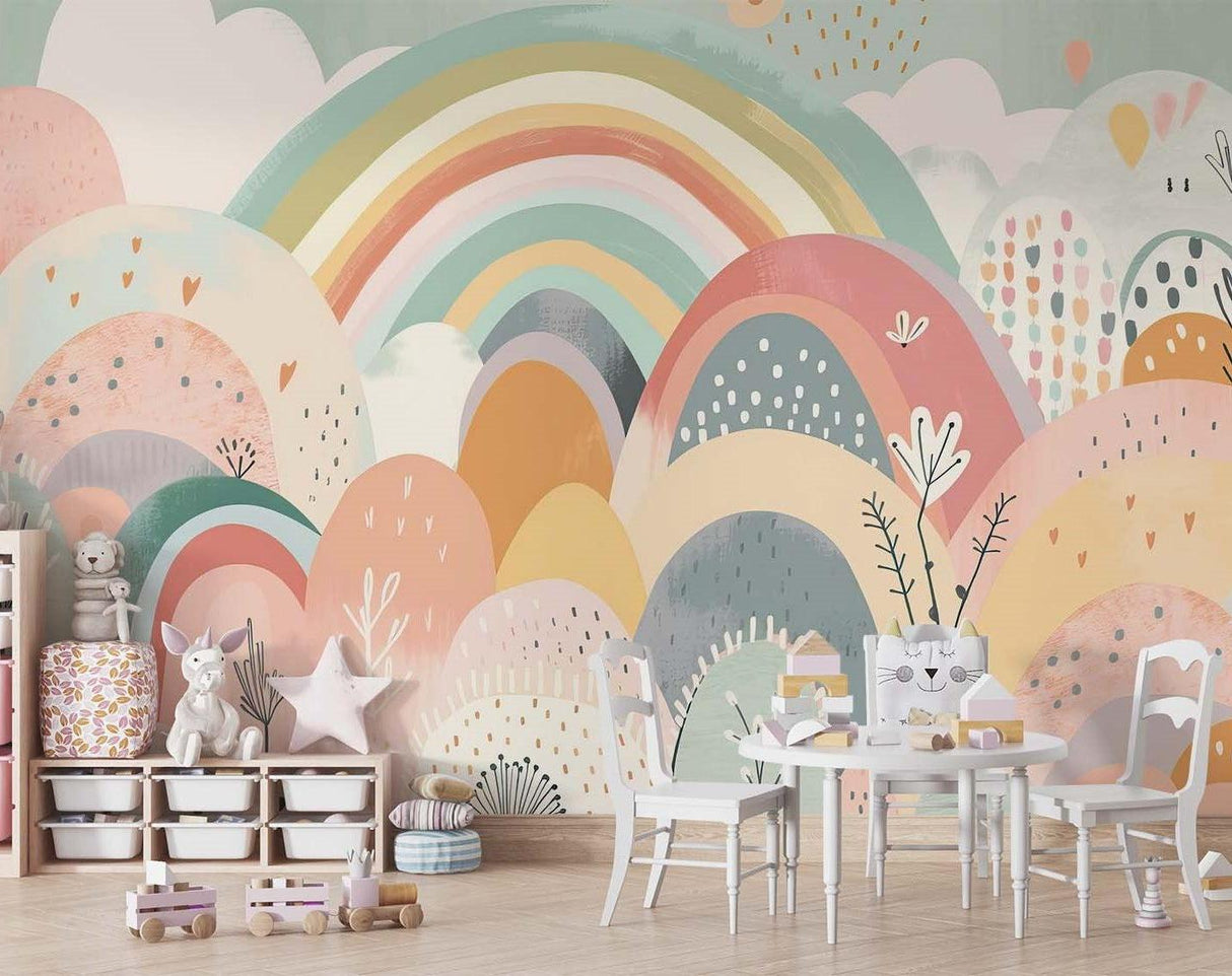 Pastel hills wallpaper adding soft color to a modern baby's room with white furniture