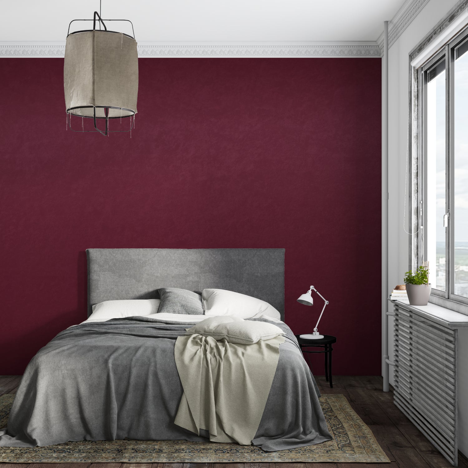 Deep red wall mural adding warmth to minimalist dining room setting
