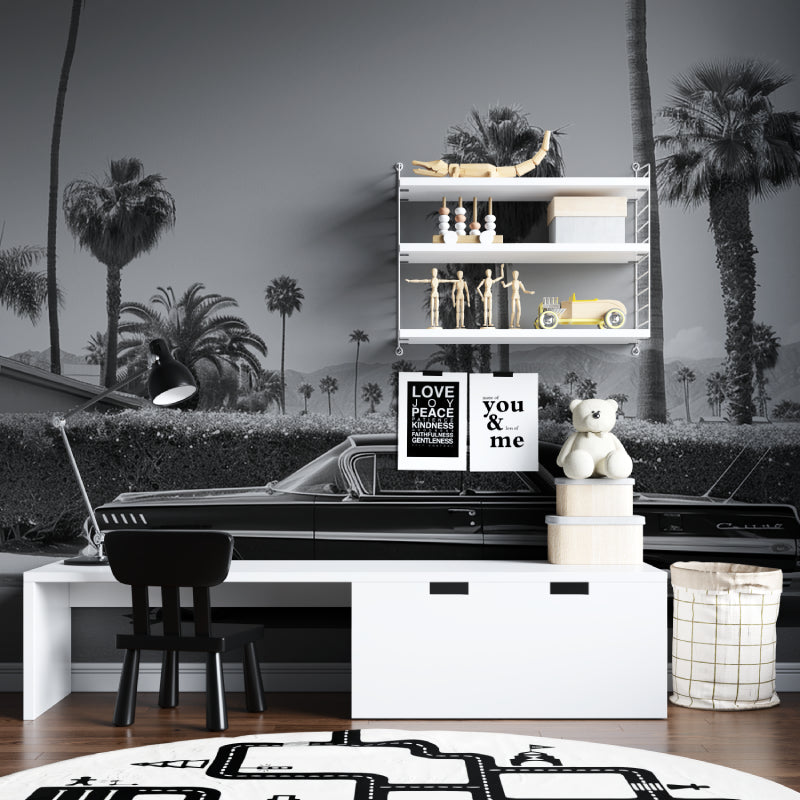 Black and white vintage car wallpaper making statement in home office
