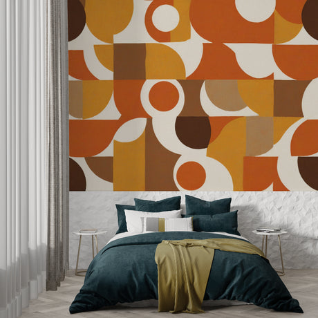 Retro geometric wallpaper in modern living room showing orange and brown 70s pattern creating warm atmosphere