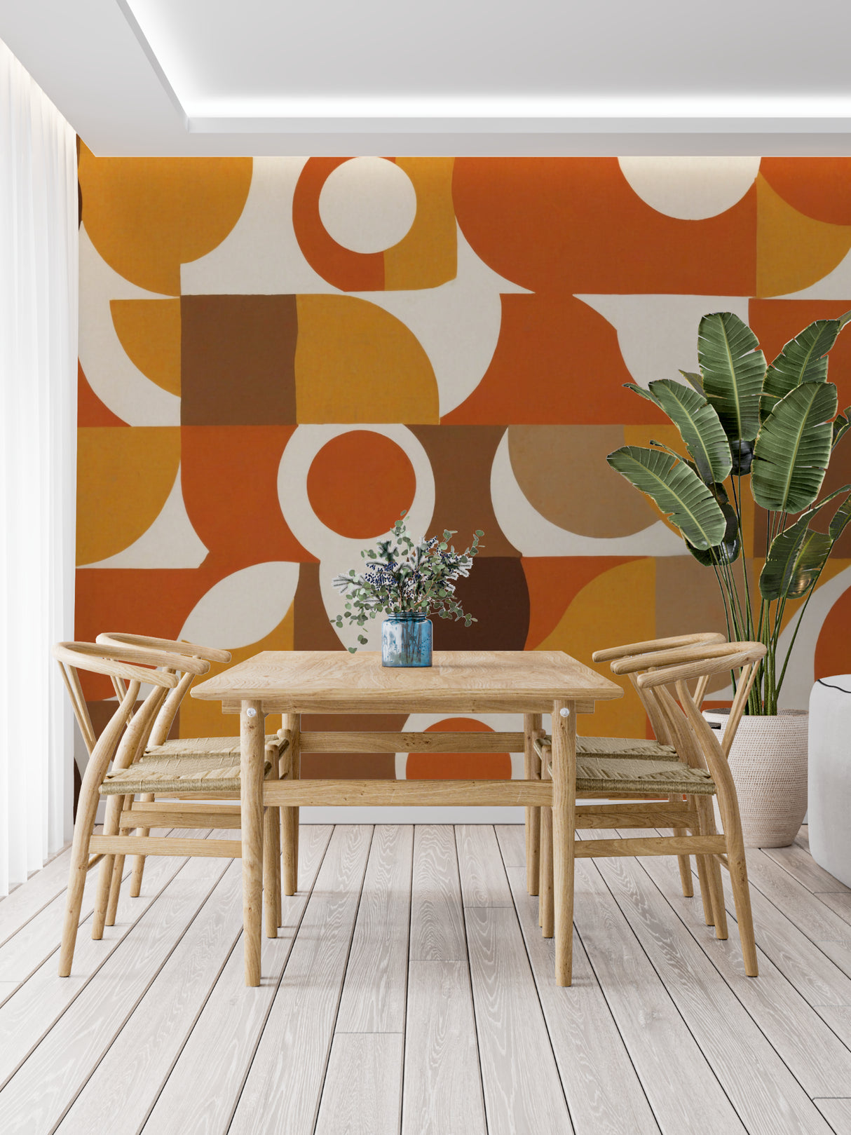70s geometric wall mural in dining room with mid-century furniture and warm lighting