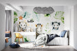 Safari animals wallpaper in bright nursery showing lions and zebra, perfect for creating a playful atmosphere