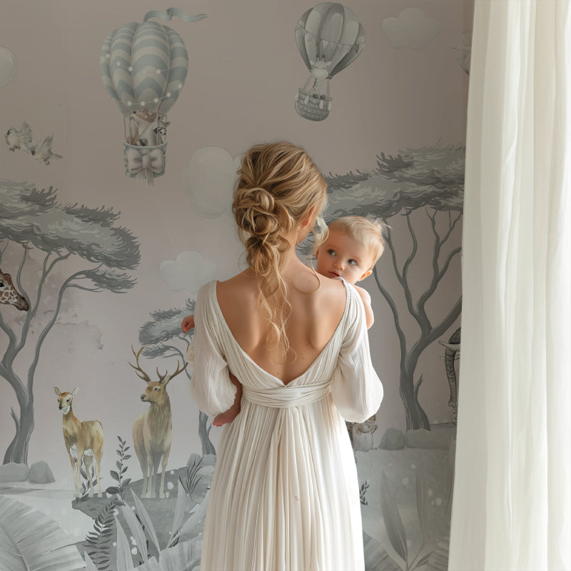 Pink nursery wallpaper showing scale in a modern children's bedroom