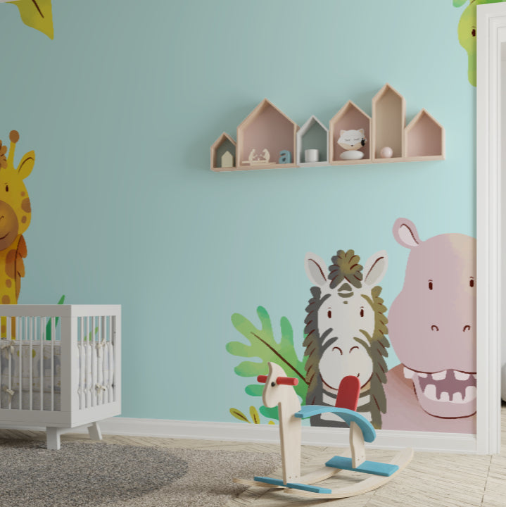 Safari nursery wallpaper bringing warmth to a modern nursery with soft mint walls and natural wood furniture