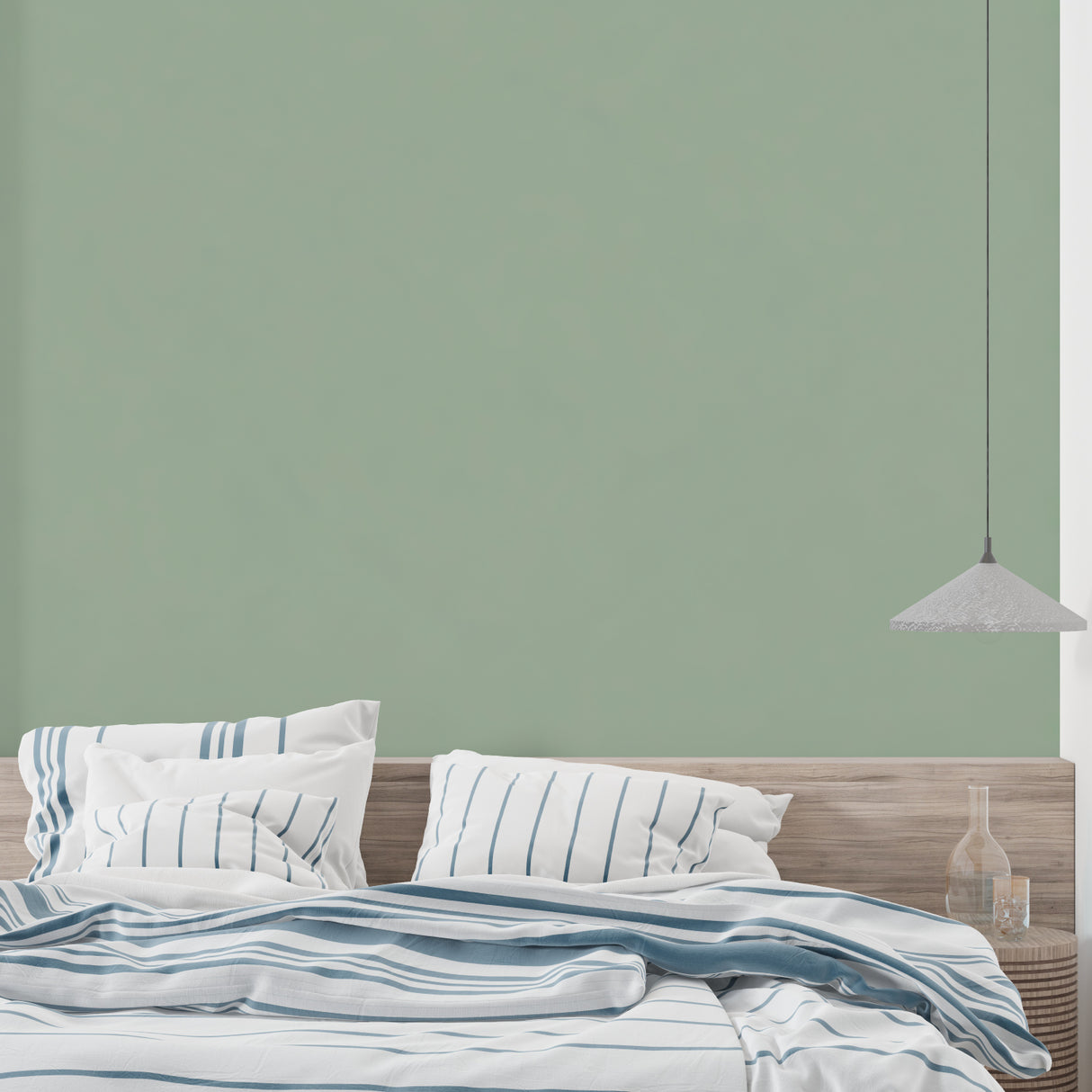 Home office featuring modern sage green wallpaper with minimal aesthetic