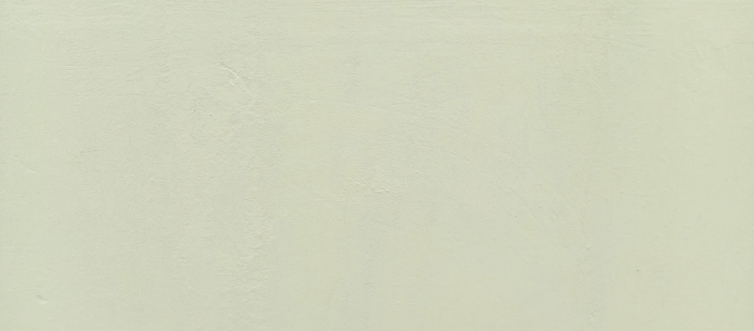 Design file of sage green minimalist wallpaper showing subtle texture and true color