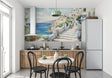 Mediterranean coastal wallpaper creating a stunning focal point in a modern living room with white furniture