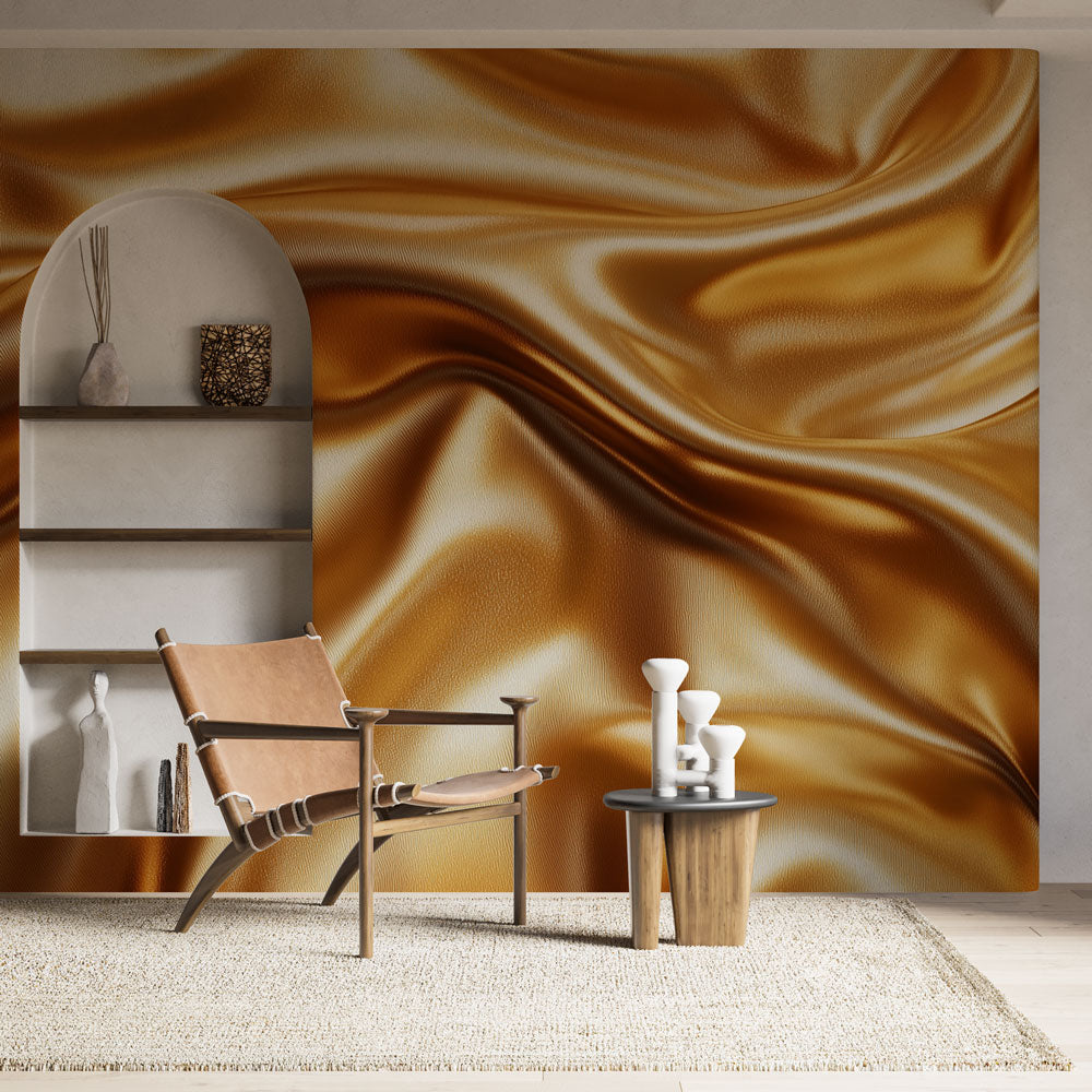 Golden wave wallpaper mural creating depth in a modern living room with natural light highlighting the silk texture